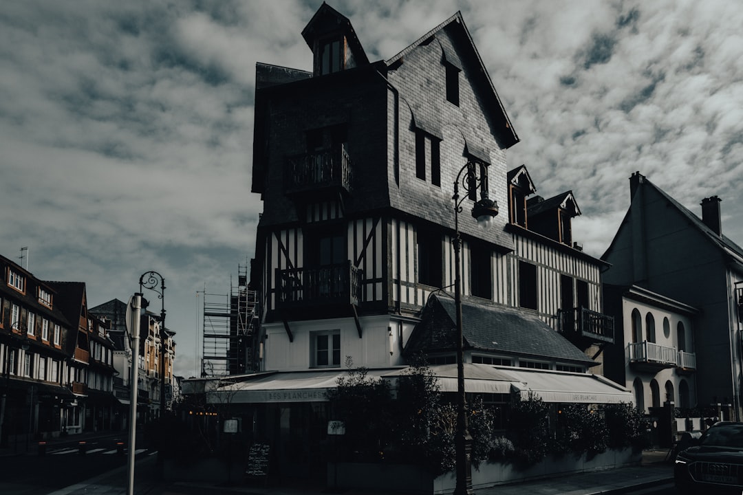 A black and white photo of a large building